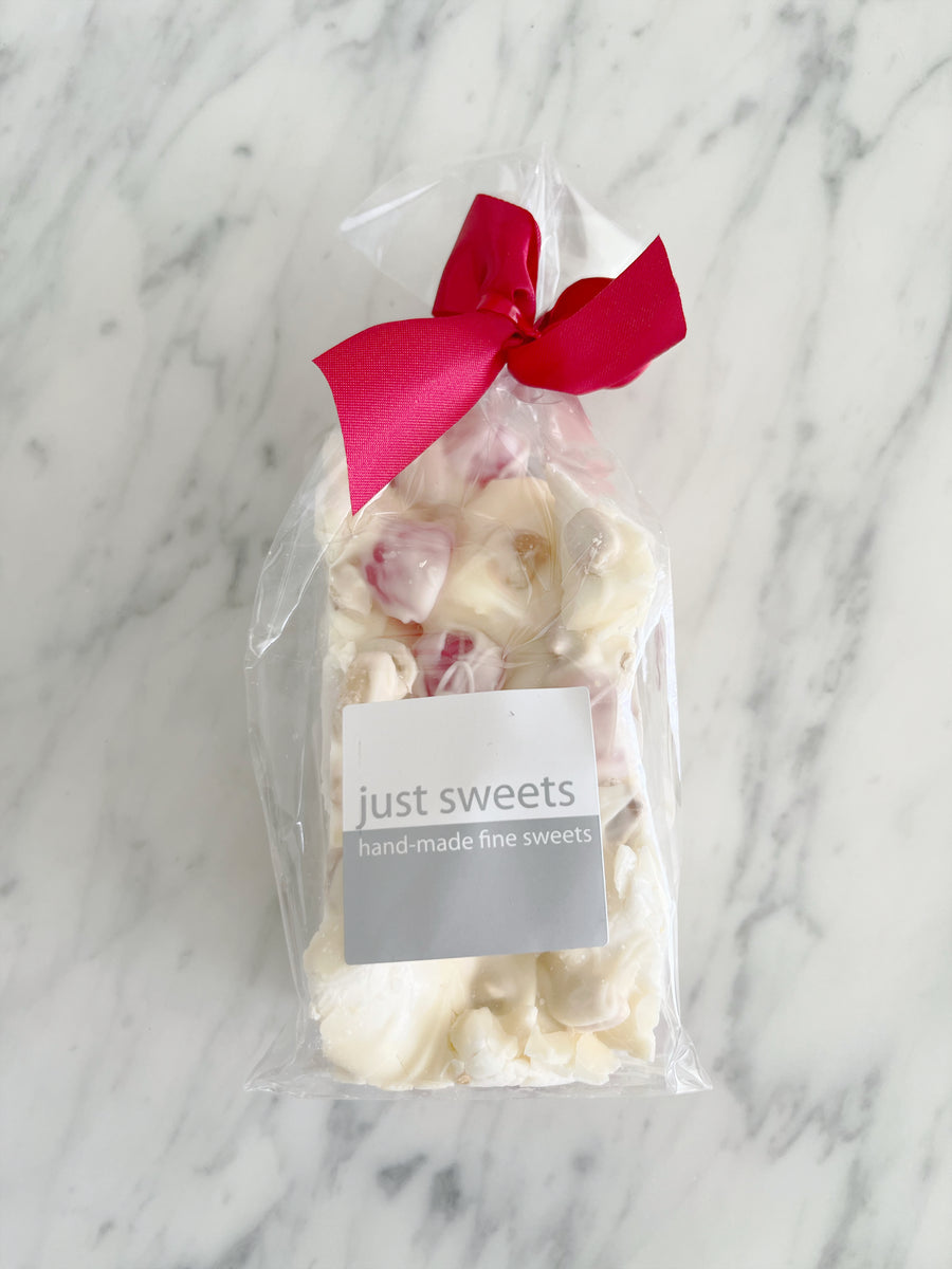 Just Sweets rocky road - Raspberry jellies with roasted peanuts in white chocolate